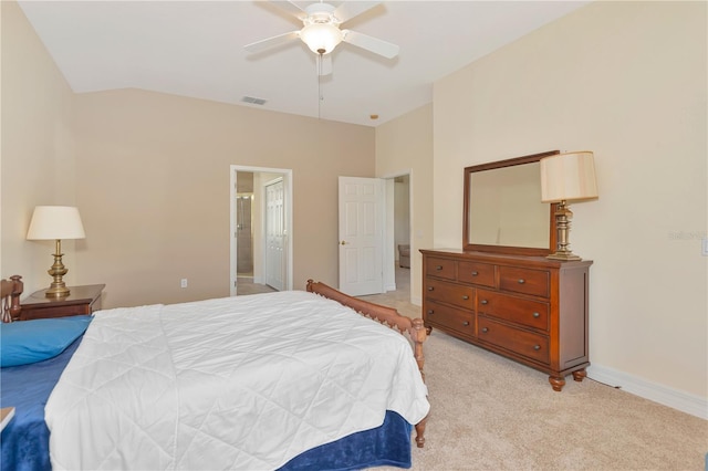 bedroom featuring ceiling fan, light colored carpet, visible vents, baseboards, and vaulted ceiling