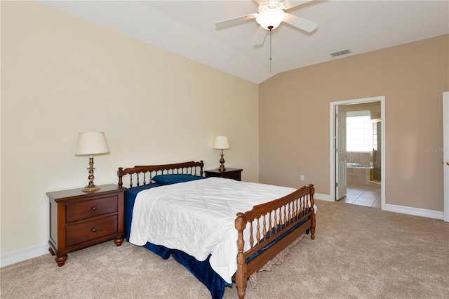 bedroom featuring lofted ceiling, visible vents, light carpet, and baseboards