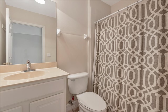 full bathroom with vanity, toilet, and a shower with curtain