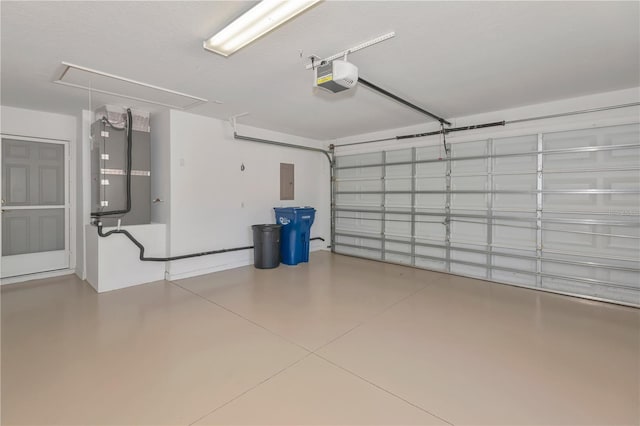 garage with a garage door opener, electric panel, and heating unit