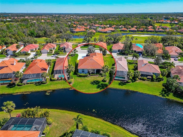 aerial view featuring a water view and a residential view