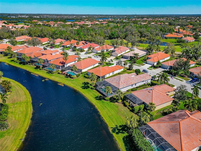 aerial view with a water view and a residential view