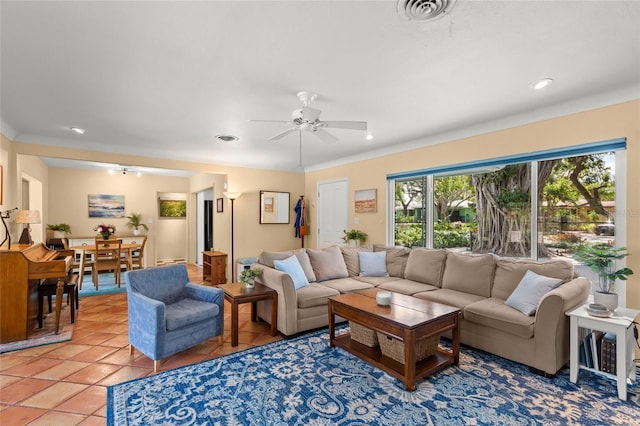 living area with light tile patterned floors, visible vents, a ceiling fan, and recessed lighting