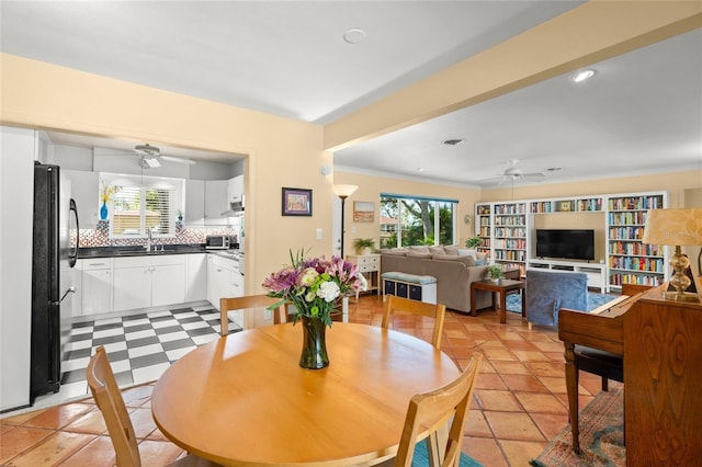 dining area with ceiling fan