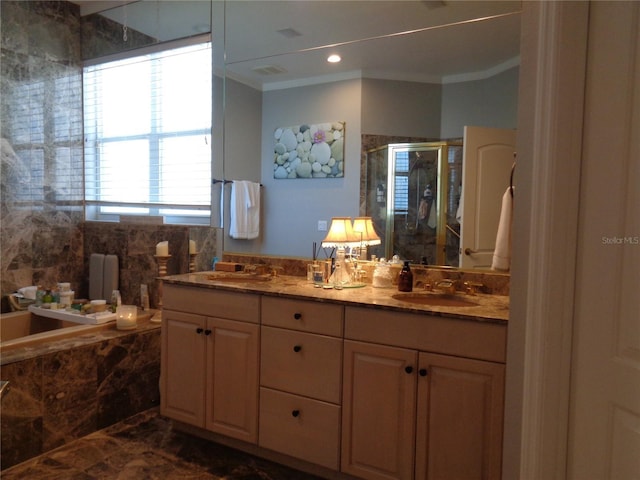 1354 Tearose Pl, Sarasota, FL 34239 - bathroom with a shower stall, ornamental molding, double vanity, and a sink