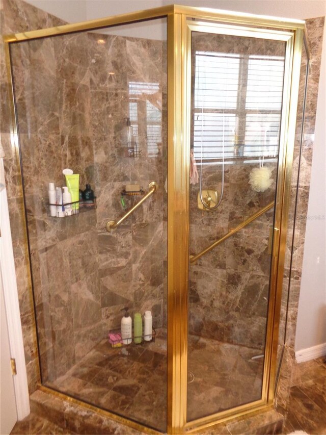 1354 Tearose Pl, Sarasota, FL 34239 - bathroom featuring a shower stall