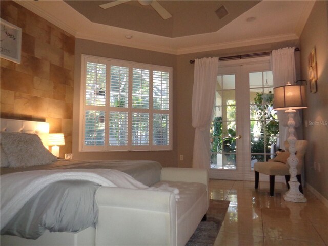 1354 Tearose Pl, Sarasota, FL 34239 - tiled bedroom with french doors, a raised ceiling, and crown molding