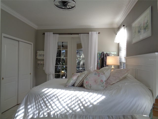 1354 Tearose Pl, Sarasota, FL 34239 - bedroom featuring a closet and crown molding