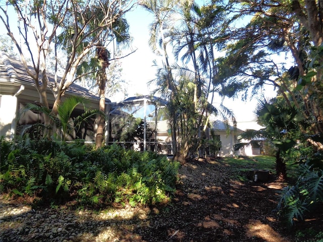 1354 Tearose Pl, Sarasota, FL 34239 - view of yard with a lanai