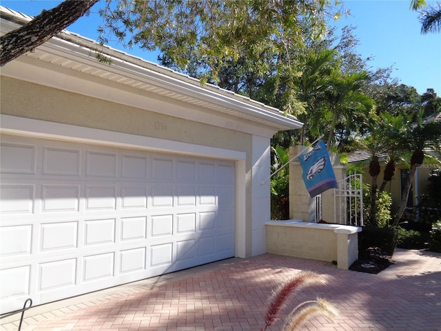 1354 Tearose Pl, Sarasota, FL 34239 - garage featuring decorative driveway