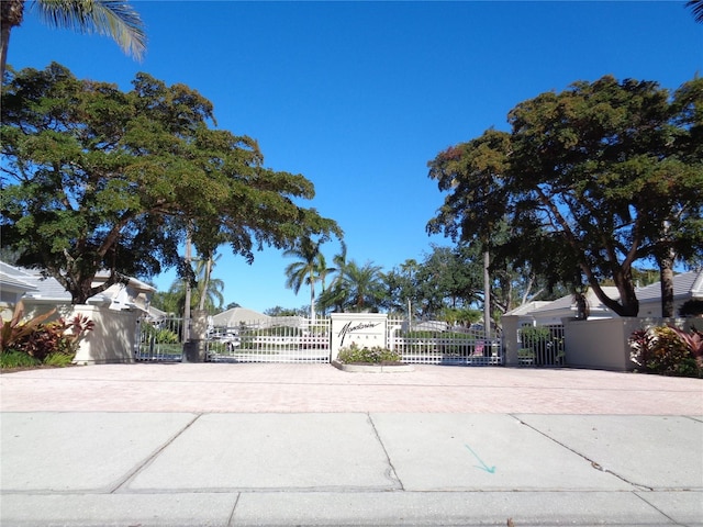1354 Tearose Pl, Sarasota, FL 34239 - view of street featuring a gate