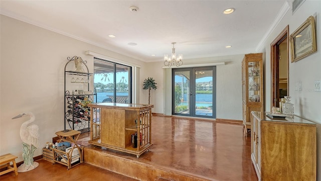 interior space with ornamental molding, french doors, baseboards, and an inviting chandelier