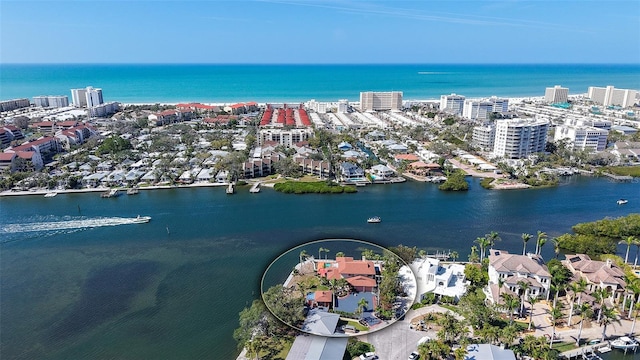 bird's eye view with a water view and a view of city