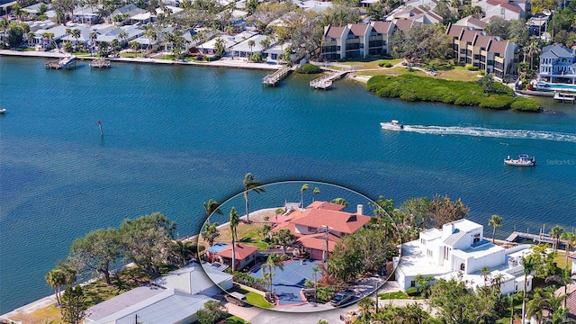 birds eye view of property with a water view and a residential view