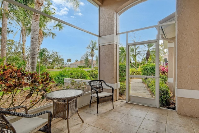 sunroom with plenty of natural light