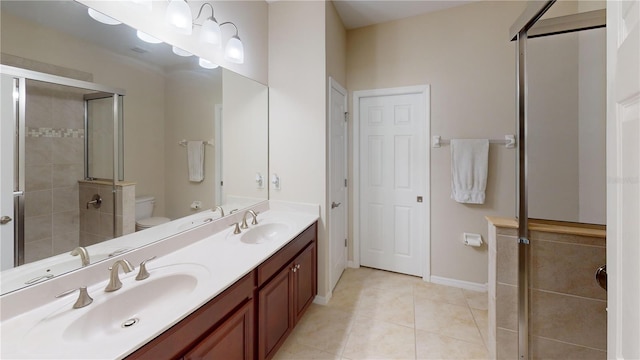 full bathroom with a stall shower, tile patterned flooring, a sink, and toilet