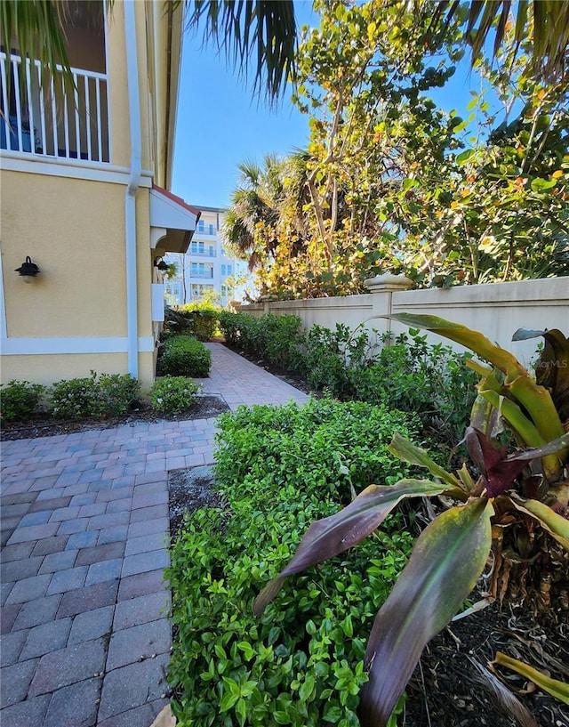 view of yard featuring a patio area and fence