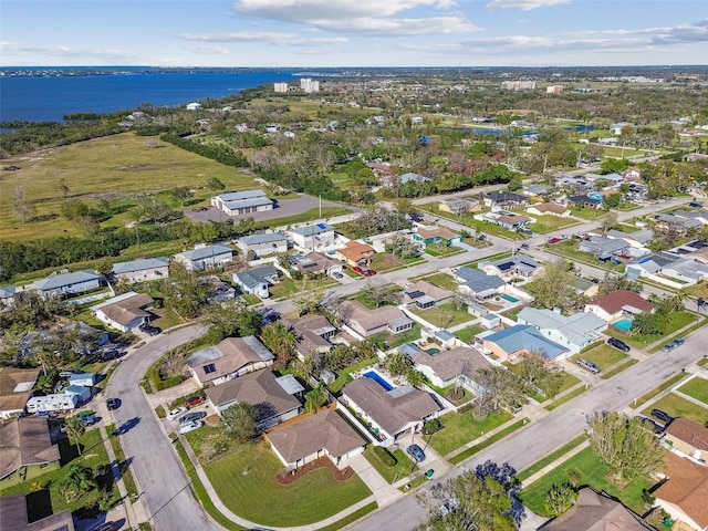 birds eye view of property with a residential view