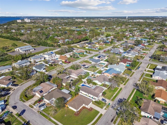 birds eye view of property with a residential view