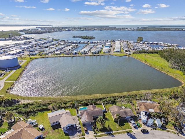 birds eye view of property featuring a water view