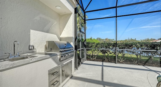 sunroom with a sink