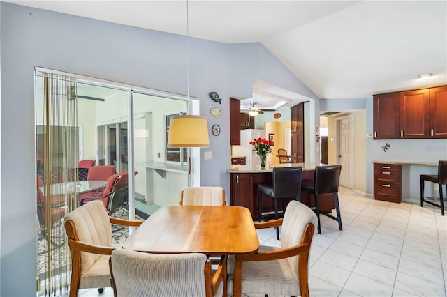 dining room with vaulted ceiling, a ceiling fan, and built in study area