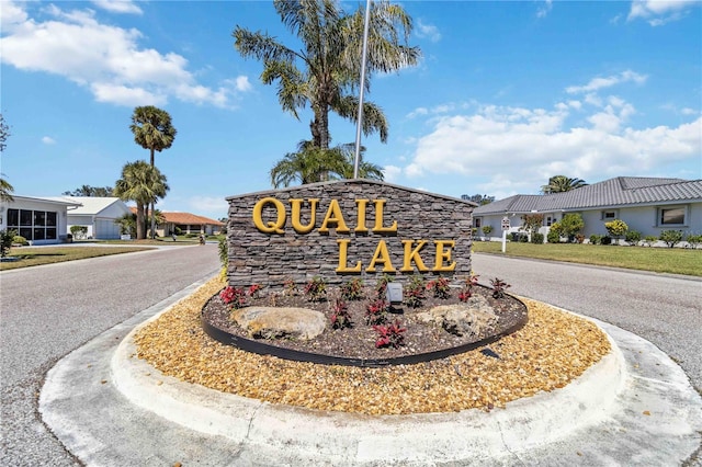 community sign with a residential view