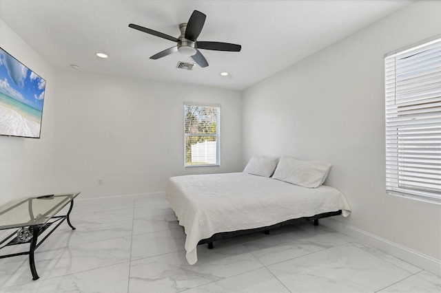 bedroom with visible vents, baseboards, and marble finish floor