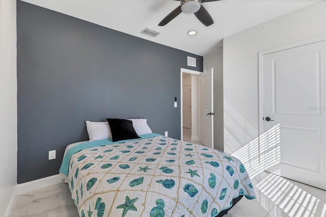 bedroom with visible vents, marble finish floor, a ceiling fan, and baseboards