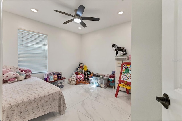 bedroom with recessed lighting, marble finish floor, and a ceiling fan