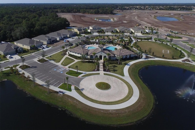 aerial view featuring a residential view and a water view