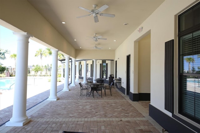 view of patio / terrace featuring outdoor dining area and a ceiling fan