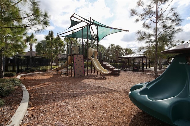 community play area featuring fence