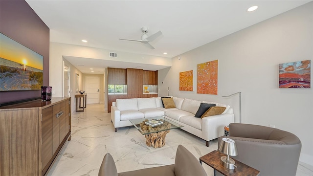 living room with ceiling fan, marble finish floor, visible vents, and recessed lighting