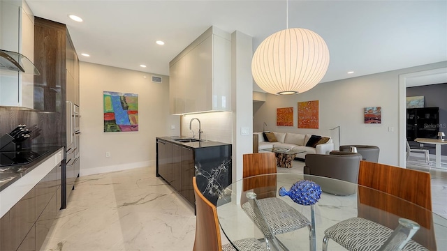 dining area with baseboards, marble finish floor, visible vents, and recessed lighting