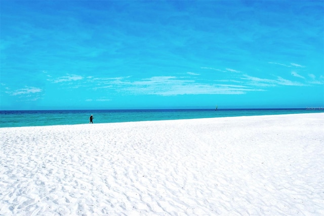 property view of water featuring a beach view