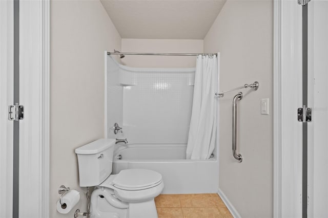 full bathroom with baseboards, toilet, tile patterned flooring, a textured ceiling, and shower / bath combination with curtain