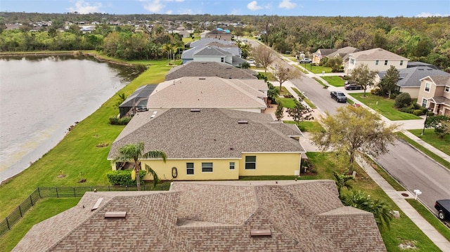 aerial view with a residential view and a water view