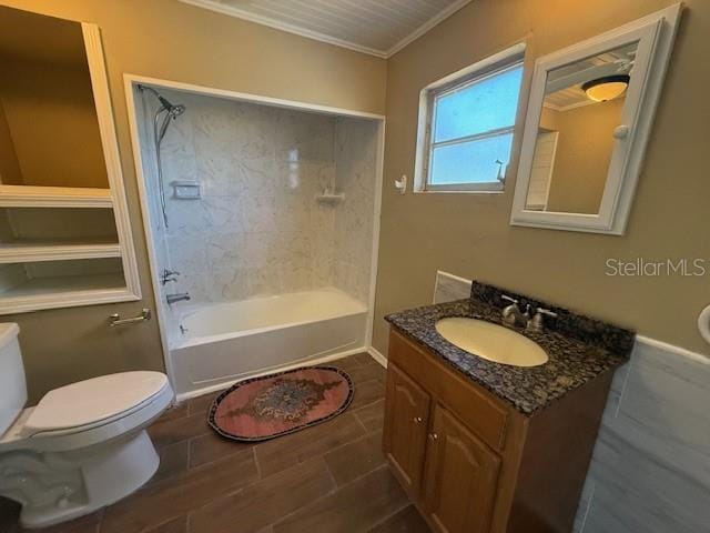 full bathroom with ornamental molding, shower / tub combination, vanity, and toilet