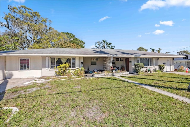 ranch-style home with a front yard