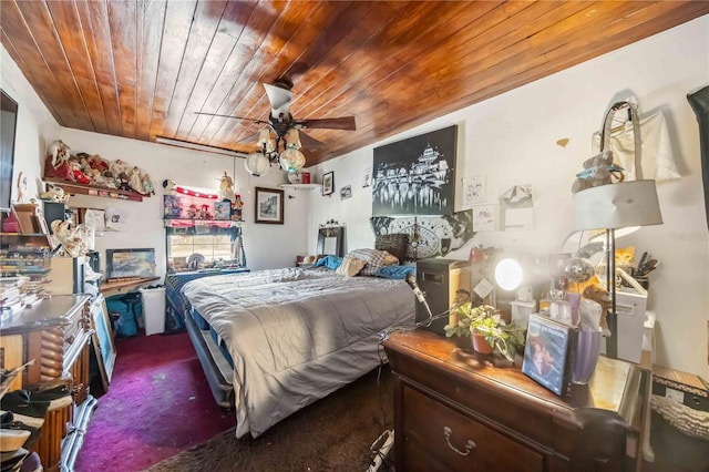 carpeted bedroom featuring wooden ceiling and ceiling fan