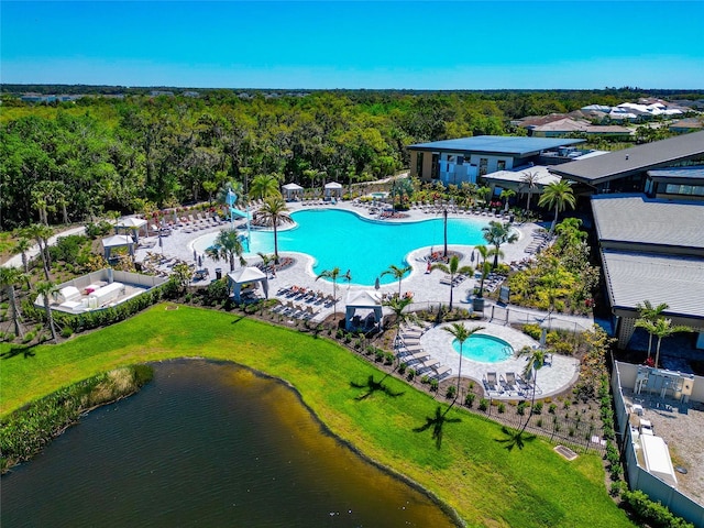 drone / aerial view with a water view