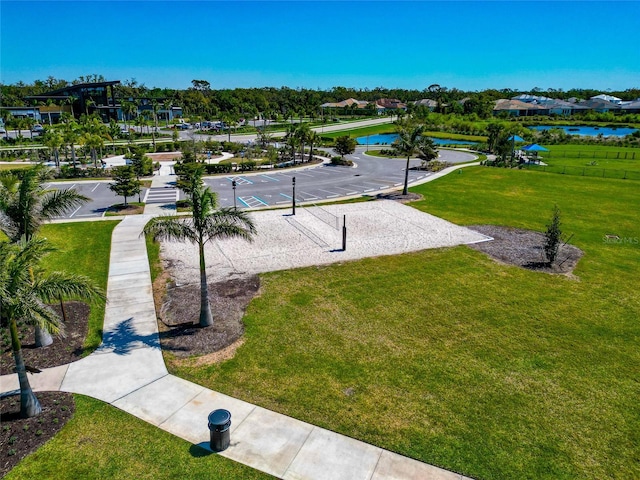 birds eye view of property with a water view