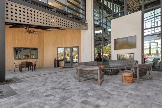 view of patio / terrace with french doors and ceiling fan