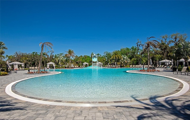 view of swimming pool featuring a gazebo