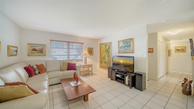 living room with light tile patterned floors