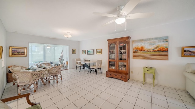 dining room with light tile patterned flooring and ceiling fan