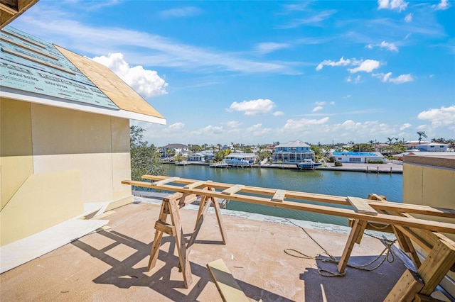 view of patio featuring a water view