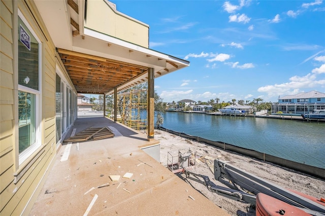 view of patio / terrace with a water view