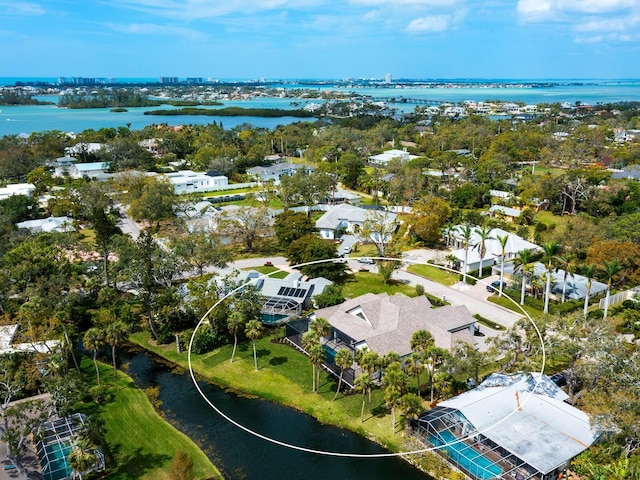 birds eye view of property featuring a water view